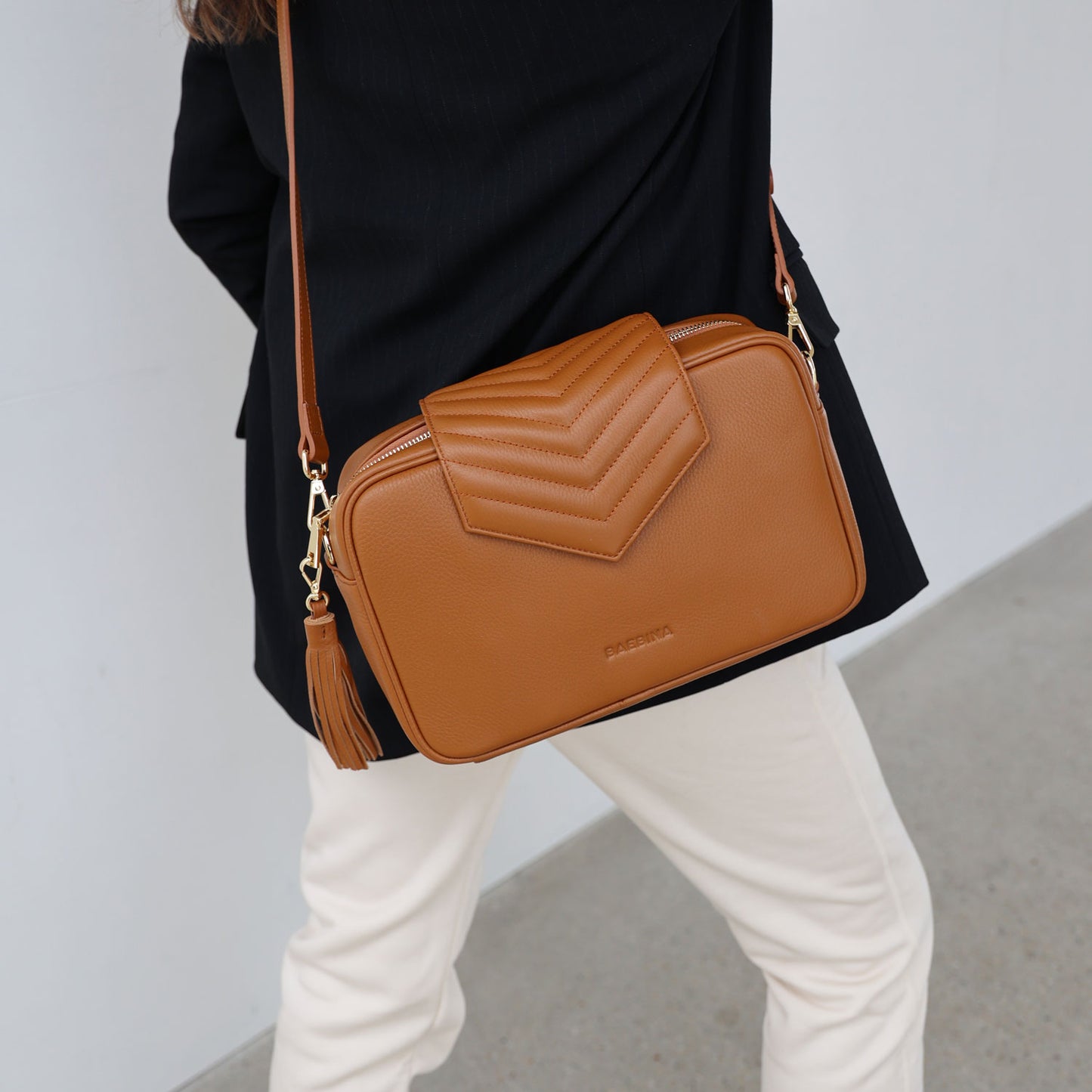 tan leather crossbody baby bag